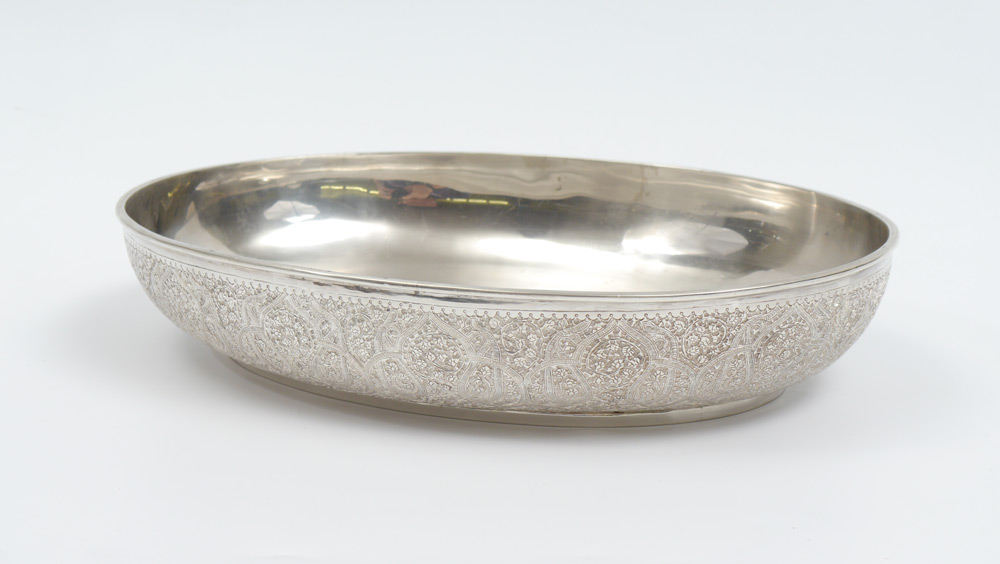 Appraisal: ENGRAVED PERSIAN SILVER CENTER BOWL Hand hammered bowl engraved sides