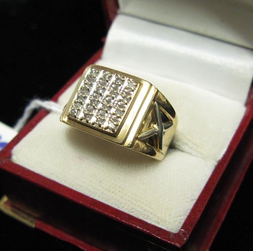 Appraisal: MAN'S DIAMOND AND TEN KARAT GOLD RING the yellow gold