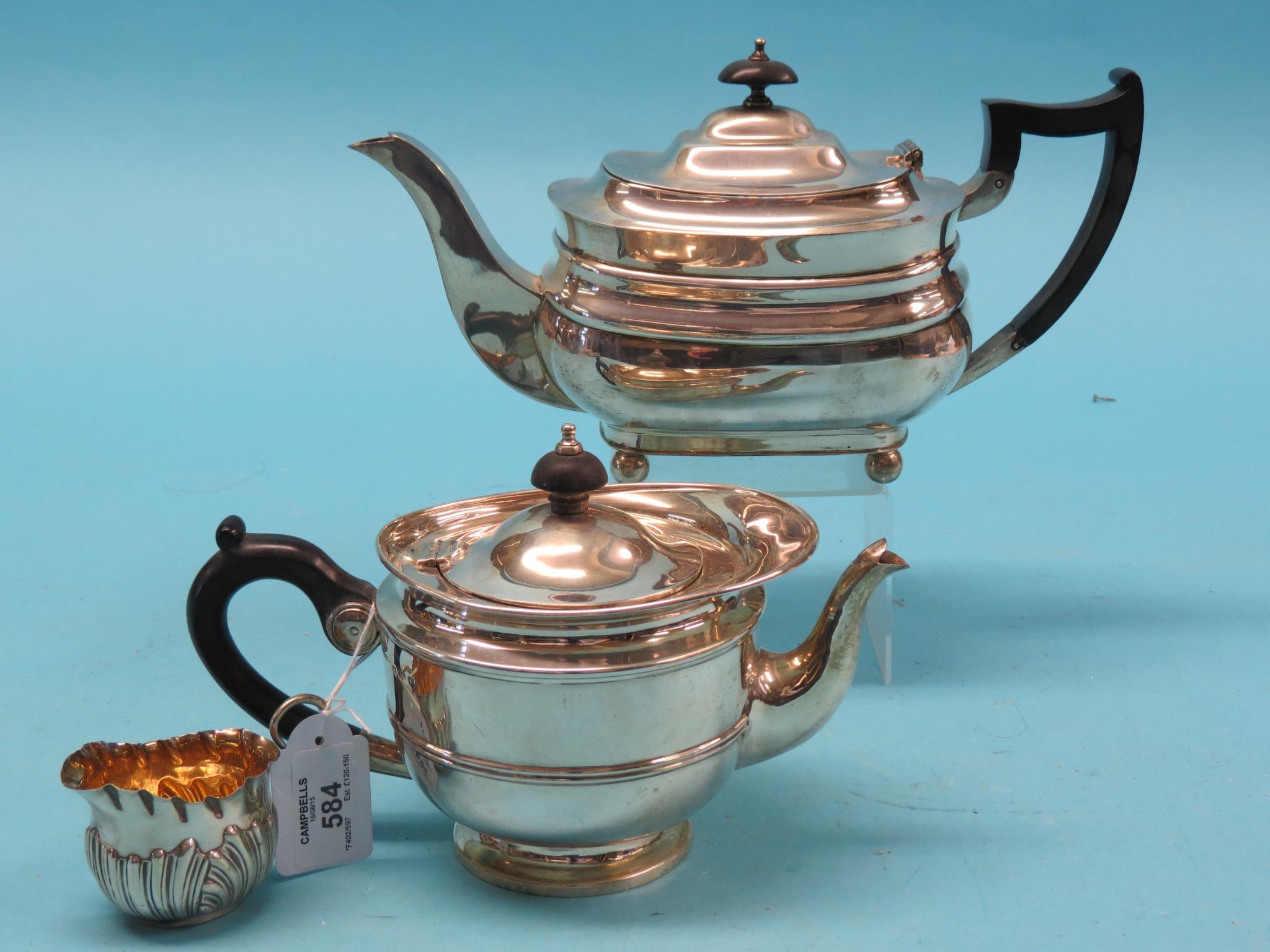 Appraisal: A silver teapot and matching sugar bowl Birmingham approx oz