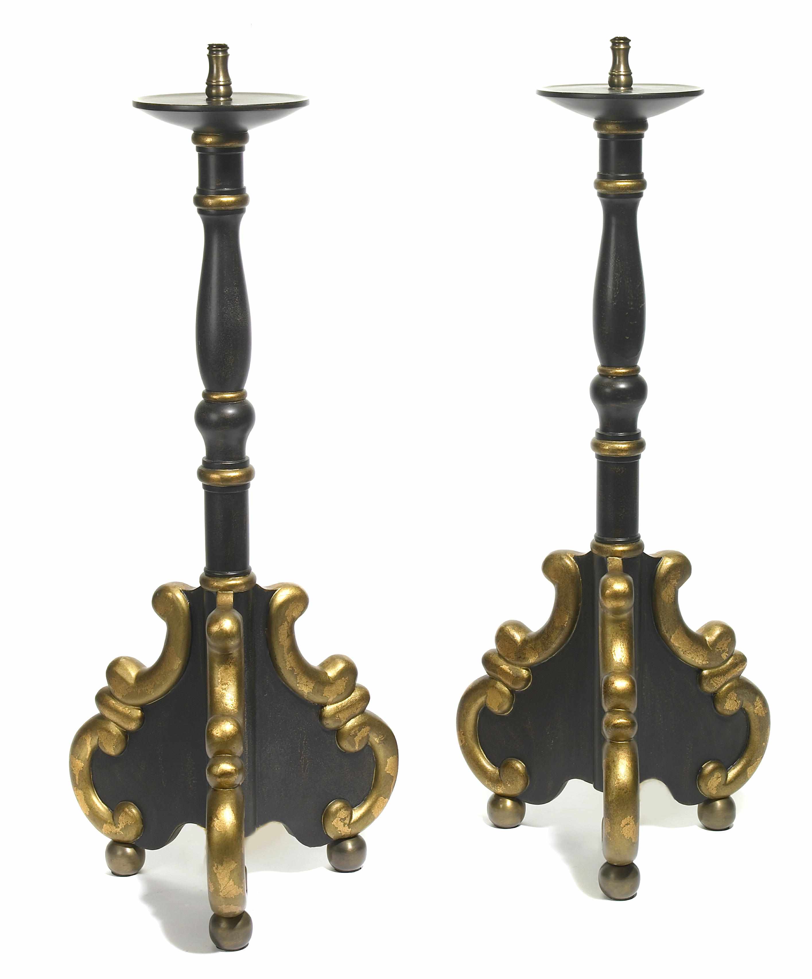 Appraisal: A pair of Baroque style parcel gilt ebonized table lamps