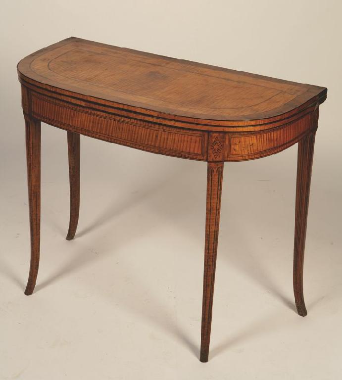 Appraisal: A GEORGE III SHERATON STYLE SATINWOOD CARD TABLE the D