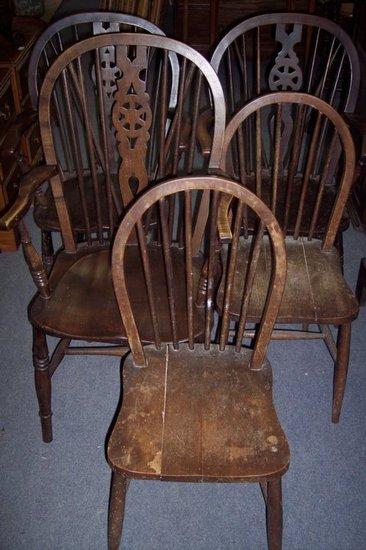 Appraisal: Three wheelback Windsor type chairs and two stick back examples