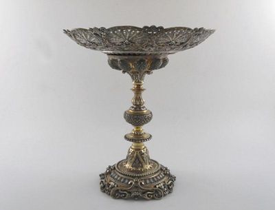 Appraisal: A Victorian parcel-gilt tazza on a scrolling open-work base knopped