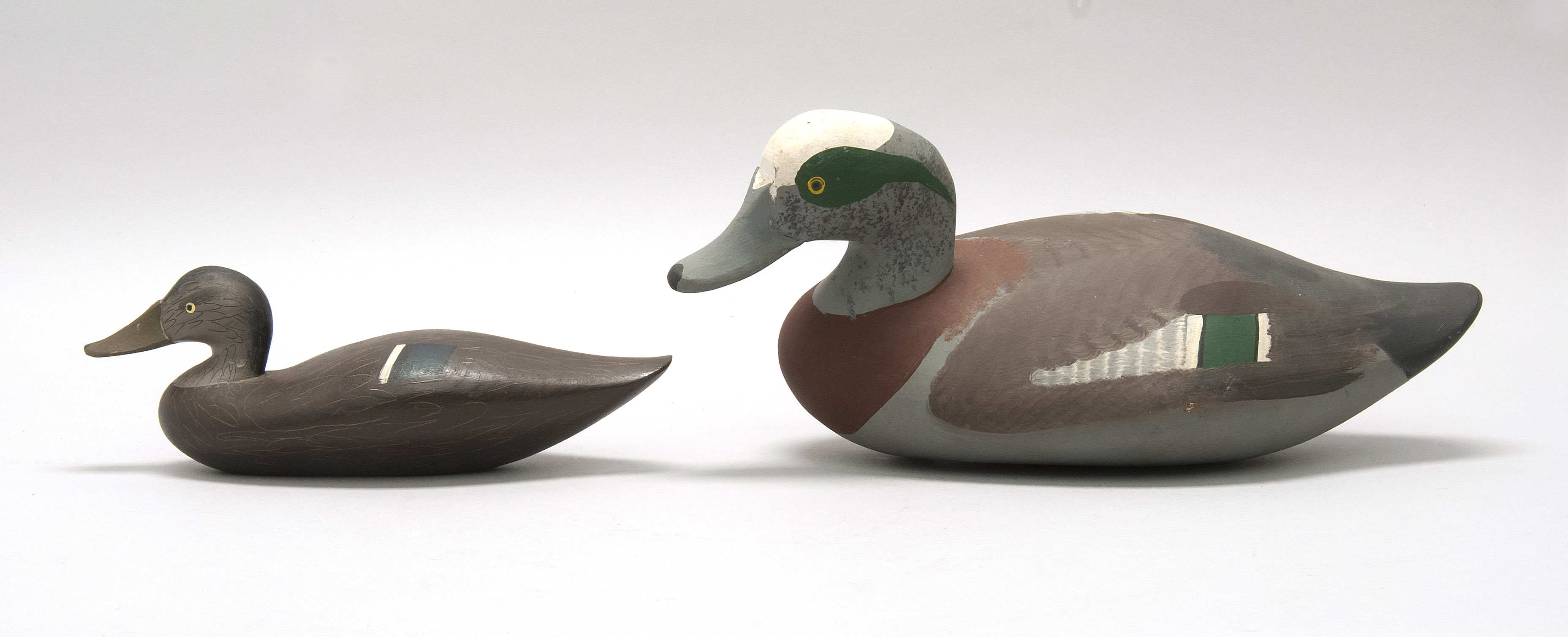 Appraisal: TWO CHESAPEAKE BAY BIRD CARVINGS a widgeon drake decoy by