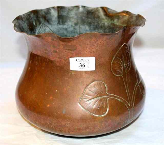 Appraisal: AN ART NOUVEAU COPPER JARDINIERE with embossed decoration and a