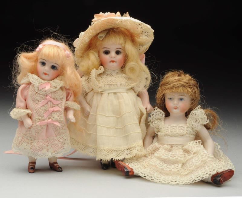 Appraisal: Lot Of All-Bisque Dolls Pouty Kestner girl with glass eyes