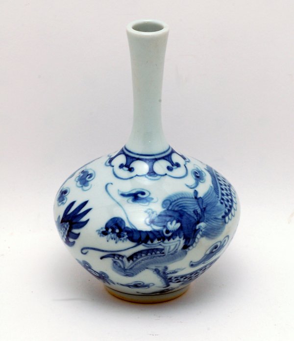 Appraisal: Blue and white vase with dragon motif marked under base