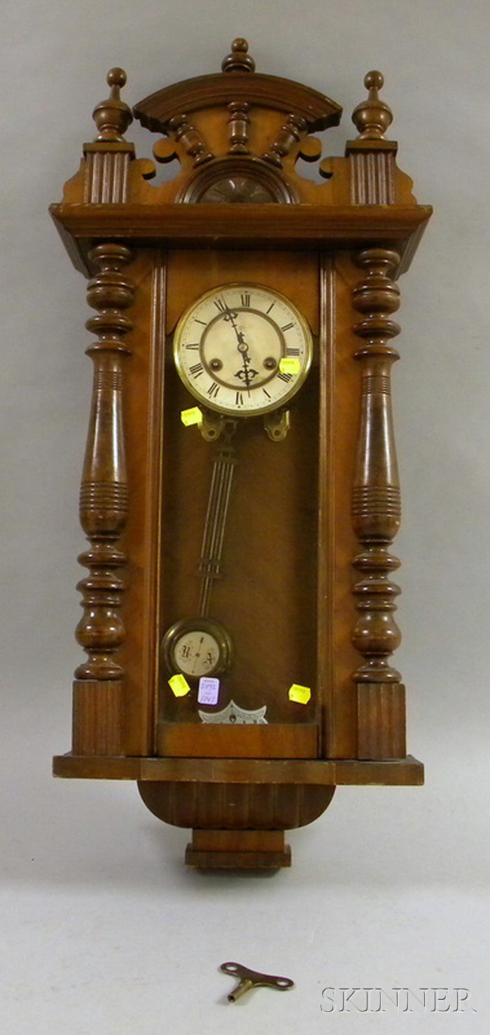 Appraisal: Victorian Walnut Wall Clock by Junghans Germany with removable carved