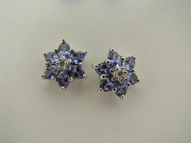 Appraisal: Lady's k white gold and tanzanite floral motif earrings with