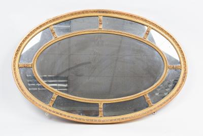 Appraisal: A George III style oval gilt framed mirror with marginal