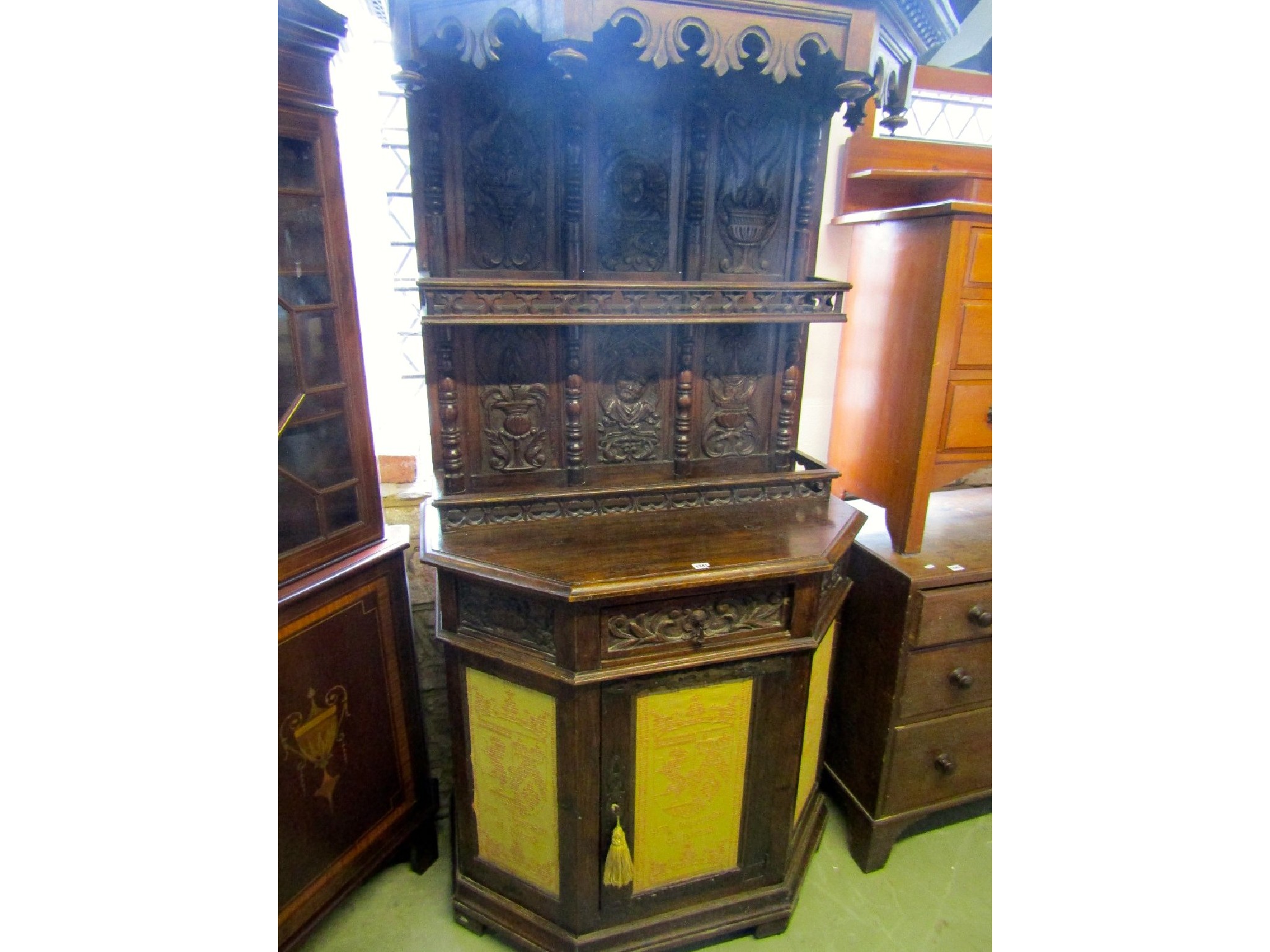 Appraisal: A th century gothic revival oak breakfront side cupboard the