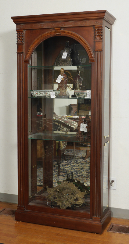 Appraisal: PULASKI DISPLAY CURIO CABINET Illuminated interior glass shelves mirror back