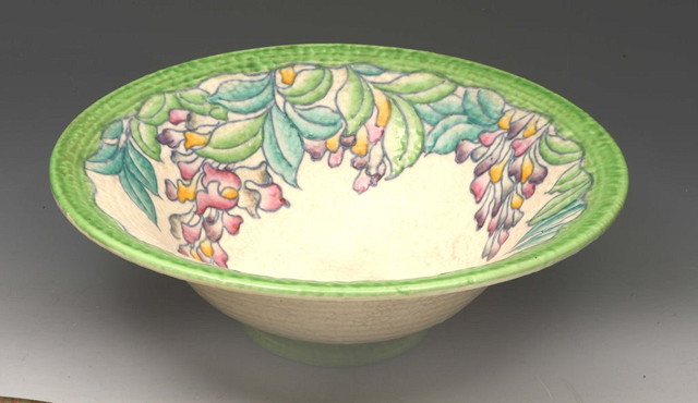 Appraisal: A CHARLOTTE RHEAD BOWL with tube-lined flower decoration signed and