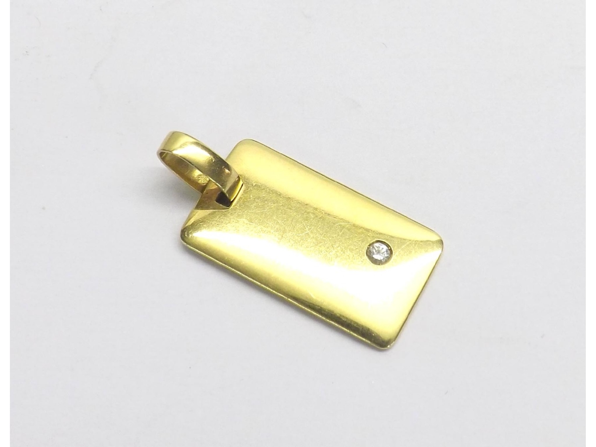 Appraisal: ct yellow gold oblong pendant set with a single round-brilliant