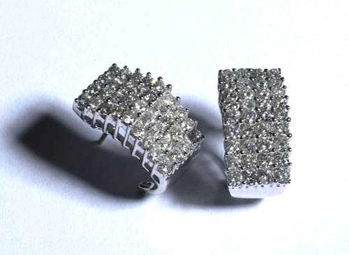 Appraisal: BRILLIANT-CUT DIAMOND CREOLE EARRINGS White gold Casual-elegant creole clip earrings