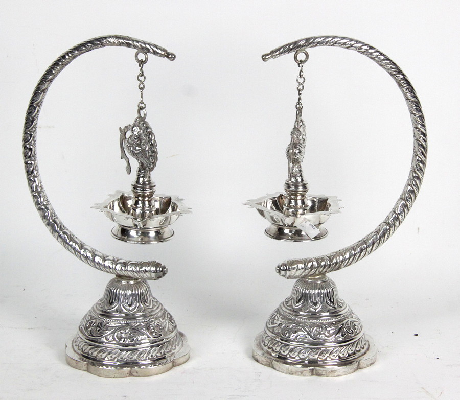 Appraisal: A pair of white metal Indian table lamps