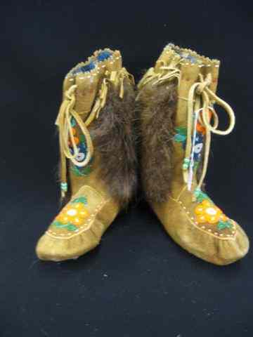 Appraisal: Indian Boots beaded leatherwork fur trim