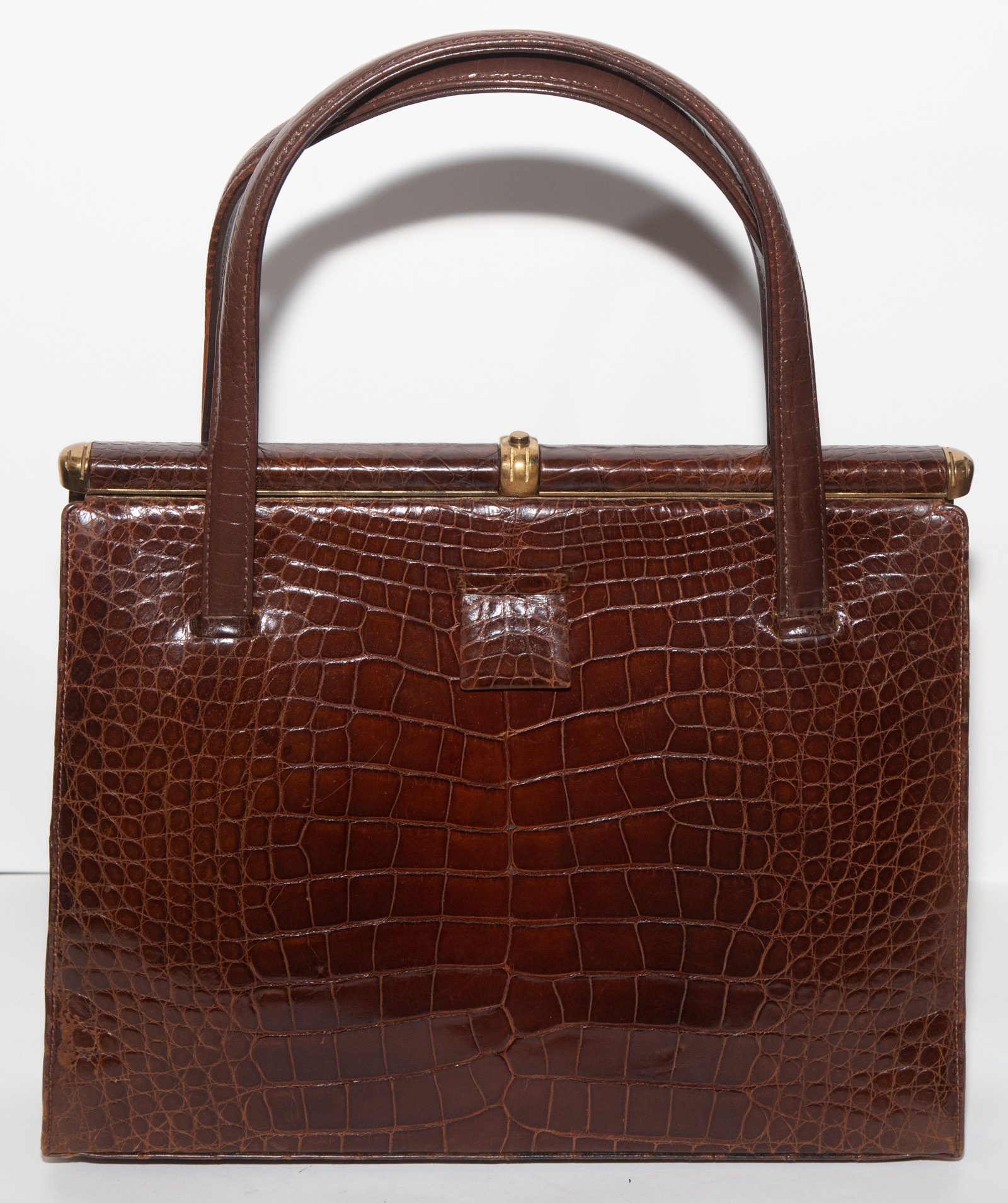 Appraisal: LUCILLE DE PARIS BROWN ALLIGATOR HANDBAG s- s in H