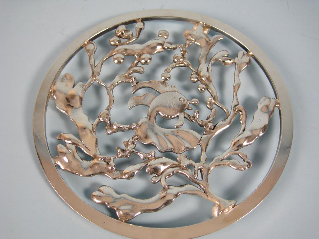 Appraisal: A sterling silver open work Teapot Stand with fish bubbles