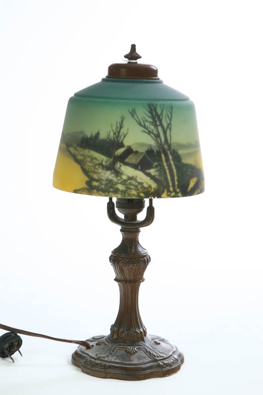 Appraisal: BOUDOIR LAMP The small lamp has reverse scenes of farms