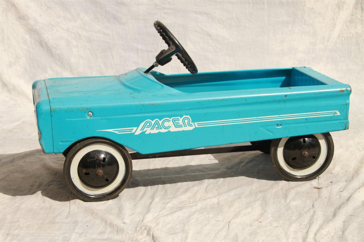 Appraisal: Pacer pressed steel pedal car sky blue missing hubcaps h