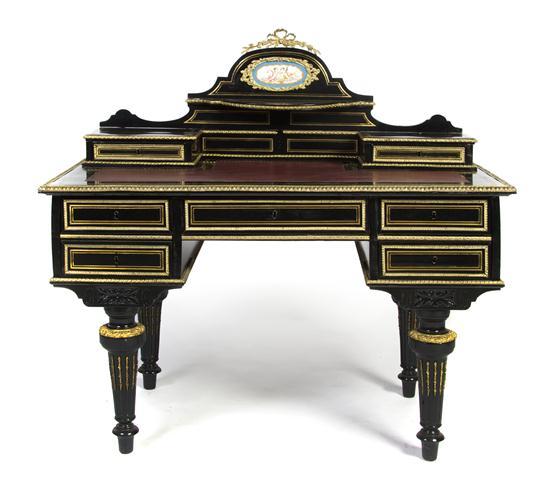 Appraisal: Napoleon III Ebonized Gilt Bronze and Porcelain Inset Bureau Plat