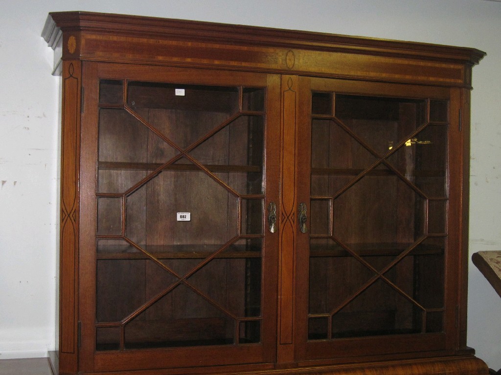 Appraisal: Mahogany and inlaid astragal glazed bookcase top