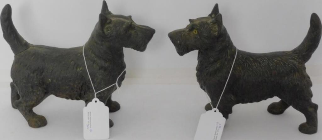 Appraisal: PAIR OF TH CENTURY CAST IRON SCOTTIE DOGS long high