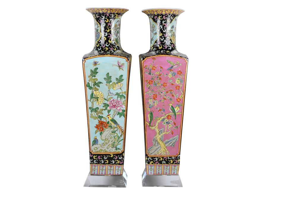 Appraisal: PAIR OF CHINESE FAMILLE NOIRE STYLE PORCELAIN TEMPLE VASESresting on