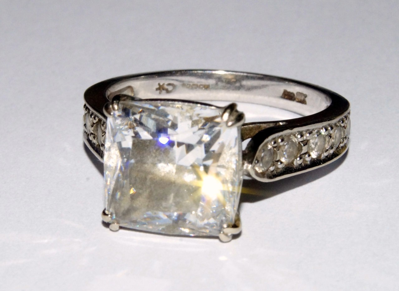 Appraisal: A white ct gold solitaire ring set with a square