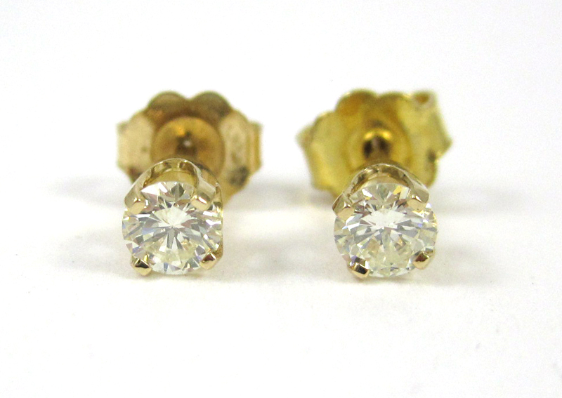 Appraisal: PAIR OF DIAMOND EAR STUDS each k yellow gold set