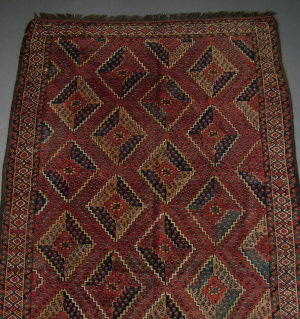 Appraisal: ADDITIONAL LOT-A Beshir carpet the brick red field with step