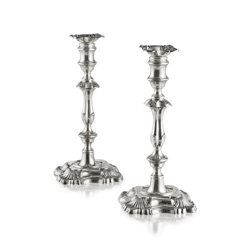 Appraisal: A pair of George III style table candlesticks William Hutton