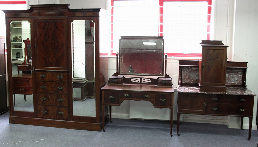 Appraisal: An Edwardian mahogany bedroom suite with ebony stringing comprising wardrobe