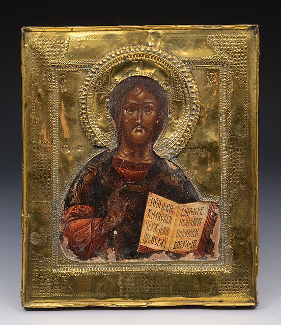 Appraisal: A TH CENTURY RUSSIAN ICON with embossed and engraved mounts