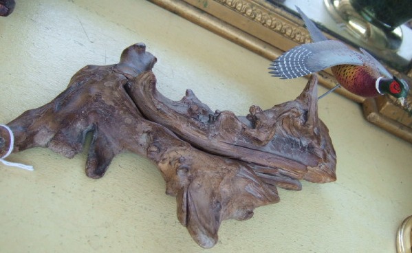 Appraisal: A carved and painted wood sculpture of a pheasant in