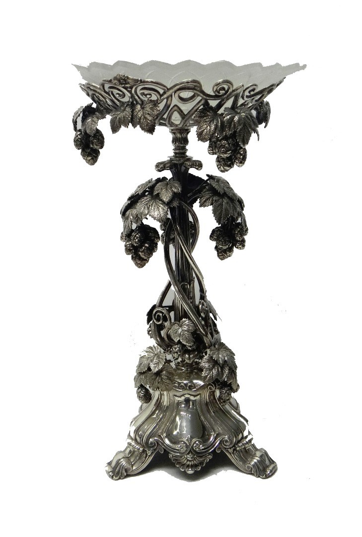 Appraisal: A Victorian plated table centrepiece stand of rustic form decorated