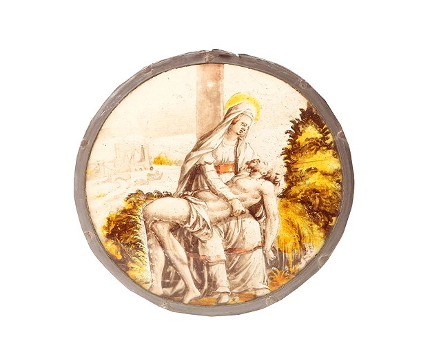 Appraisal: A CIRCULAR STAINED GLASS PANEL depicting the Pieta probably French