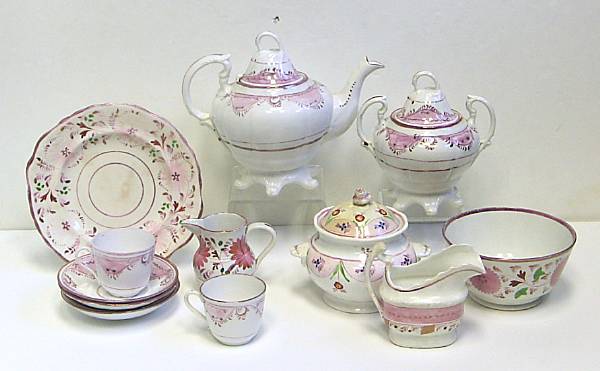 Appraisal: Three Staffordshire porcelain pink luster and polychrome tea services first