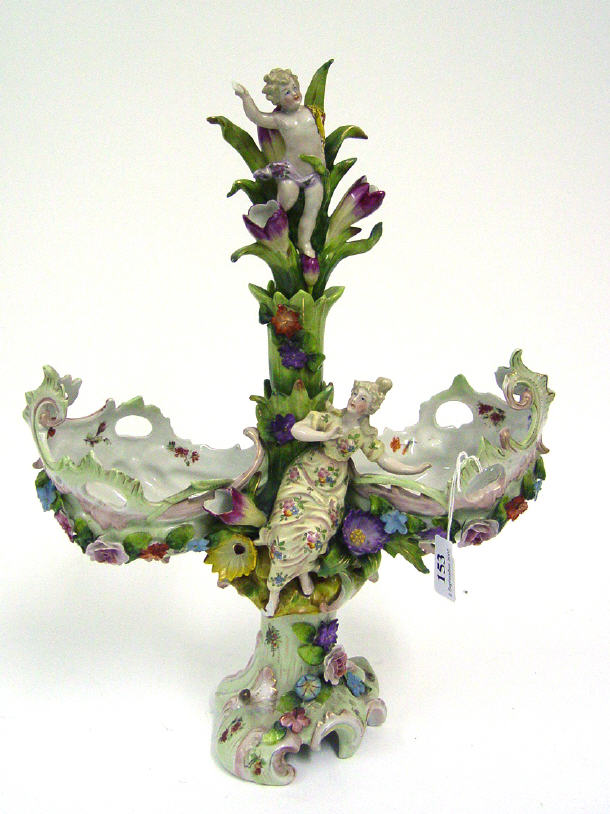 Appraisal: Continental porcelain centre piece modelled as a floral stem with