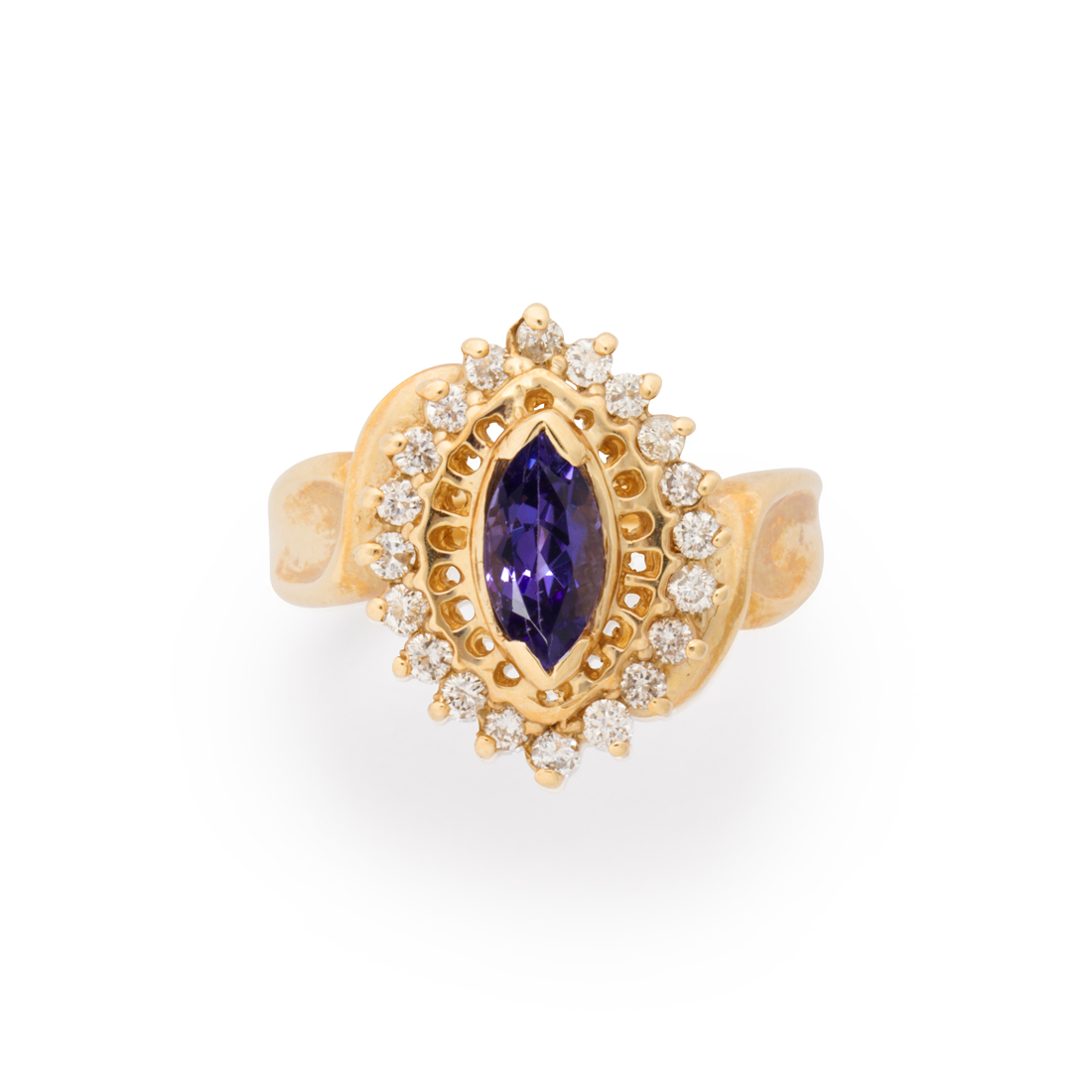 Appraisal: A TANZANITE DIAMOND AND FOURTEEN KARAT GOLD RING A tanzanite