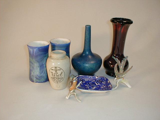 Appraisal: An early thC pottery bottle vase decorated with mottled blue