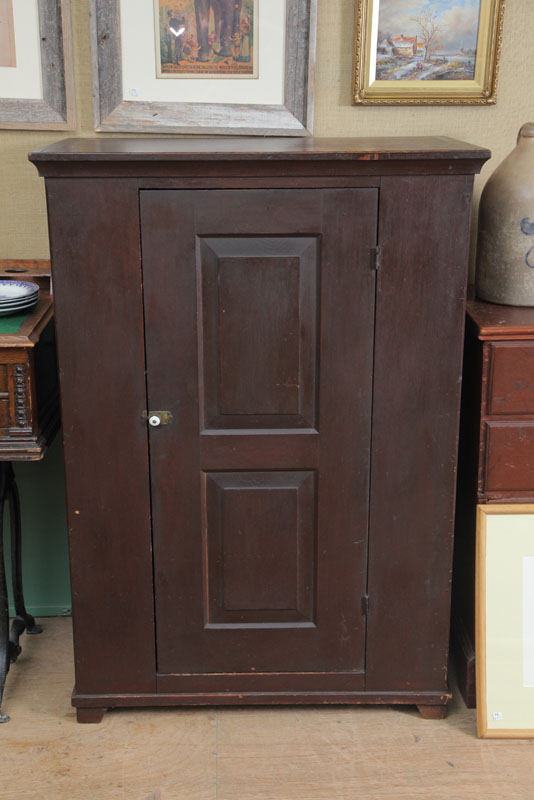 Appraisal: SINGLE DOOR CABINET Pine having old brown paint and paneled