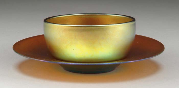 Appraisal: STEUBEN AURENE FINGER BOWL UNDERPLATE Lovely gold Aurene bowl and