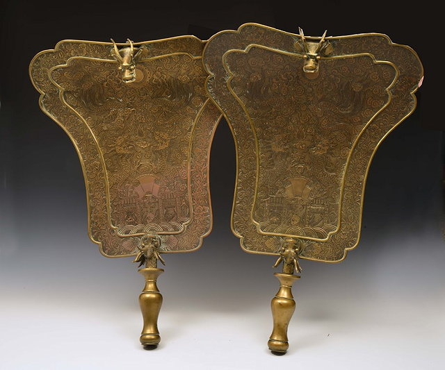 Appraisal: A PAIR OF BRASS FAN SHAPED TEMPLE STANDARDS each of