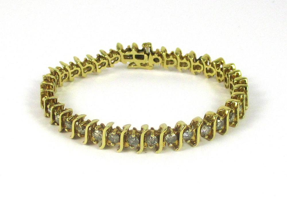 Appraisal: DIAMOND AND FOURTEEN KARAT GOLD TENNIS BRACELET measuring - in