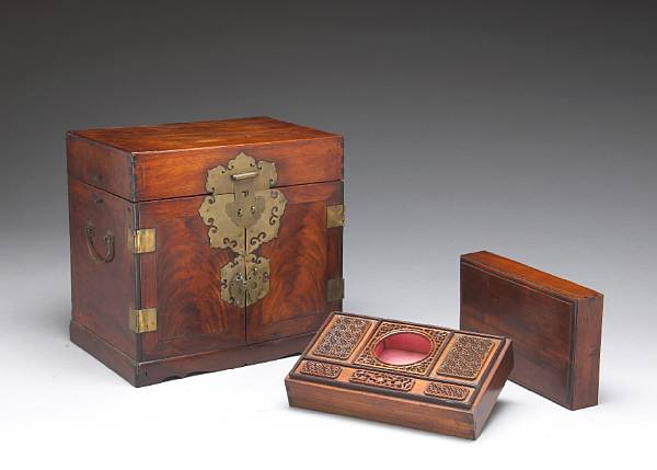 Appraisal: A huanghuali and mixed wood seal box and a carved