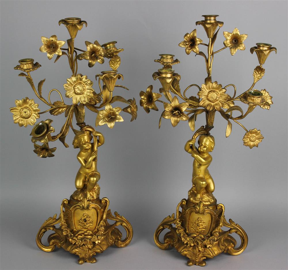 Appraisal: PAIR OF LOUIS XVI STYLE GILT BRONZE FIGURAL FIVE LIGHT