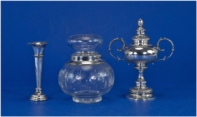 Appraisal: Silver Handled Trophy With Embossed Leaf Decoration The Handles With