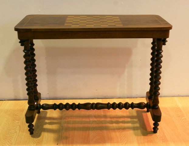 Appraisal: A Victorian walnut games table cm wide cm deep cm